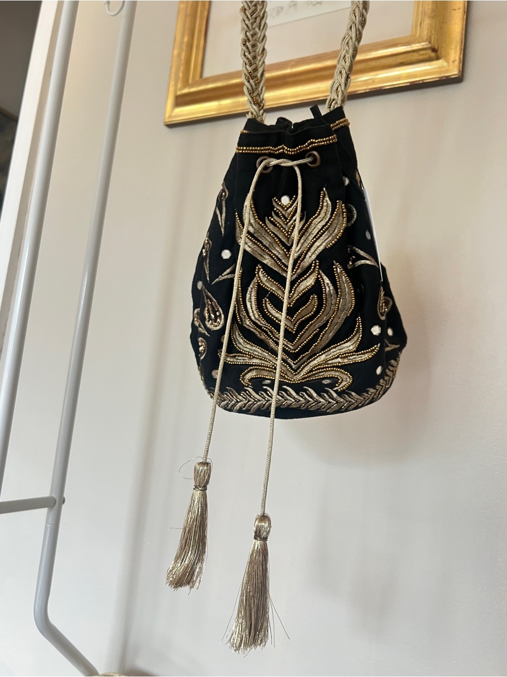 Embroidered Black Mini Drawstring Bucket Bag with Gold Tassels